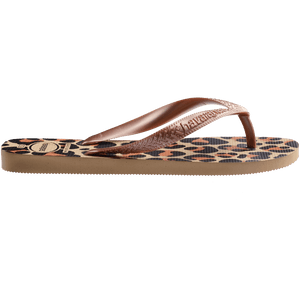 flip flops with black, brown, and beige leopard print and beige metallic straps, side view