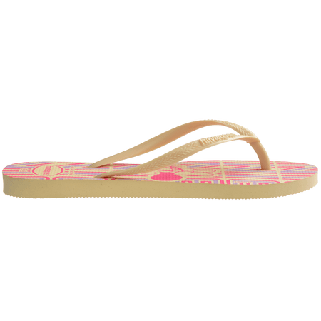 Minnie Mouse flip flops on a yellow, purple, and pink background with yellow straps, side view