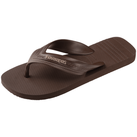 dark brown sandals with rice pattern and grooves, with brown straos with a lighter brown stitched-look detailing, side view