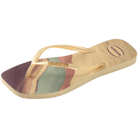 purple, yellow buttercream, teal, and mauve marble patterned flip flops with yellow buttercream straps and gold havaianas logo, side view