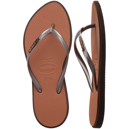 brown sandals with a dark brown outline around the footbed and metallic brown straps with a metal brown havaianas logo, one shoe top view one shoe side view