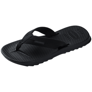 black flip flops with toe grooves and black fabric straps with a grooved sole, front left view