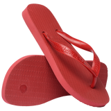 Three quarter view of pair of red Havaianas Top Flip Flops 