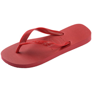 Single, left side, red Havaianas flip flop on a white background