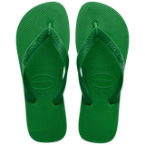 green flip flops with green straps, top view