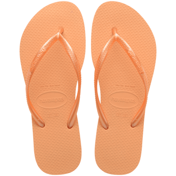 Women's orange flip flops with orange metallic straps, top view