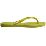 Single, right, side view, lime green flip flop with Havaianas branding on a white background