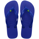 Men's cobalt blue flip flop with Brazil flag detail on the straps, top view