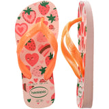 Pair of pink and orange Havaianas flip flops on a white background, with left shoe in focus