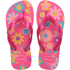 Pair of pink Havaianas flip flops with floral design on a white background