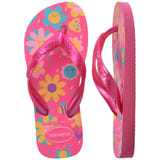 Pair of pink Havaianas flip flops with floral design on a white background, with left shoe in focus