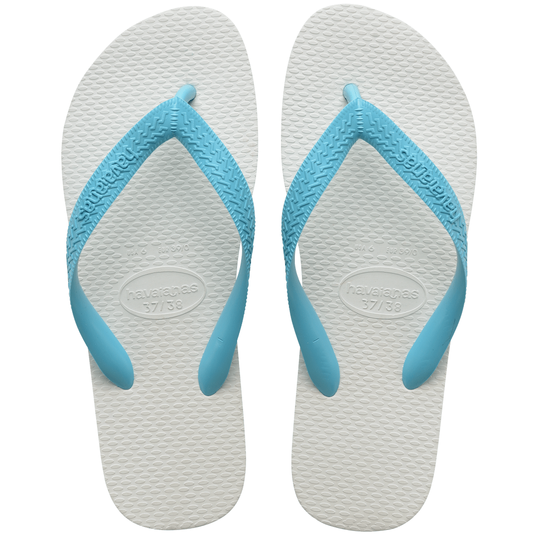 Pair of white flip flops with blue straps on a transparent background