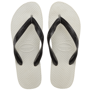 Pair of white flip flops with black straps on a transparent background