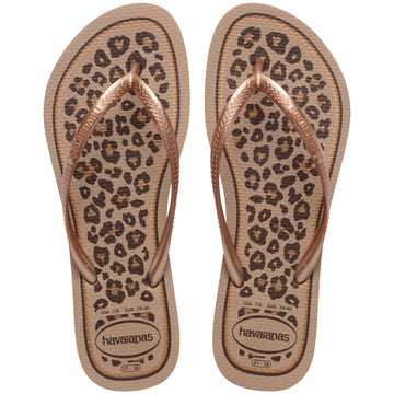 Pair of leopard print flip flops with Havaianas logo on a white background