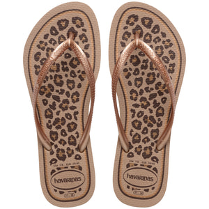 Pair of leopard print flip flops with Havaianas logo on a white background
