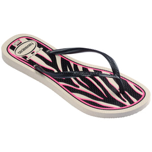 Single, right Havaianas flip flop with pink and black zebra pattern on a white background