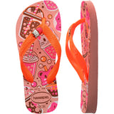 Pair of pink and orange Havaianas flip flops with prints throughout, on a white background, with left shoe in focus