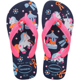Pair of blue Havaianas flip flops with pink straps on a white background