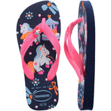 Pair of blue Havaianas flip flops with pink straps on a white background, left shoe in focus