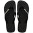 Pair of black Havaianas flip flops on a white background