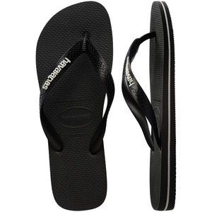 Pair of black Havaianas flip flops on a white background, with left shoe in focus