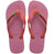 Pair of pink Havaianas flip-flops with the thicker top strap on a white background