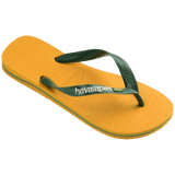 yellow flip flops with green straps, with a small brazil flag and havaianas written in white on the strap, front side view