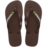 brown flip flops with havaianas written in white on the straps and a Brazil flag, top view