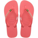 coral pink flip flops with pink straps that feature a small brazil flag, top view