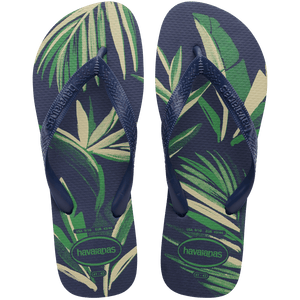 A pair of men's Havaianas flip flops with a tropical leaf print in green and white.