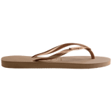 Single, right, side view, brown flip flop with Havaianas branding on a transparent background