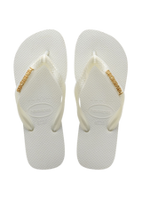 womens white top flip flops with a gold metallic havaianas logo on the strap top view