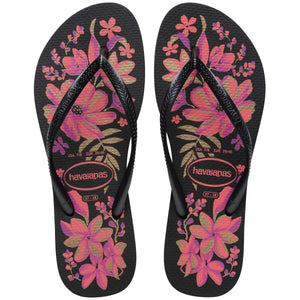 Pair of Havaianas flip flops with pink floral design on a white background