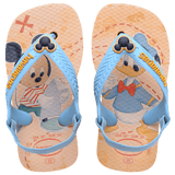baby sandals with mickey mouse and donald duck on a yellow background with blue straps and a mickey mouse charm, top view