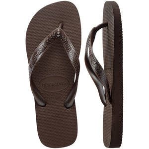 brown Havaianas flip flops on a white background