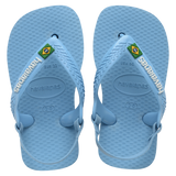Blue baby flip flops with backstrap and Brazillian flag on strap, top view