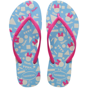 Pair of blue flip flops with pink bows and Havaianas branding on a white background
