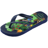 Minecraft people on a grass and water background that is blue, green, and with some flames, with navy blue straps and havaianas written in green, front left view