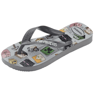 Flip flops with Minecraft blocks on a grey background, mix of green, yellow, pink, blocks and grey straps, front left view