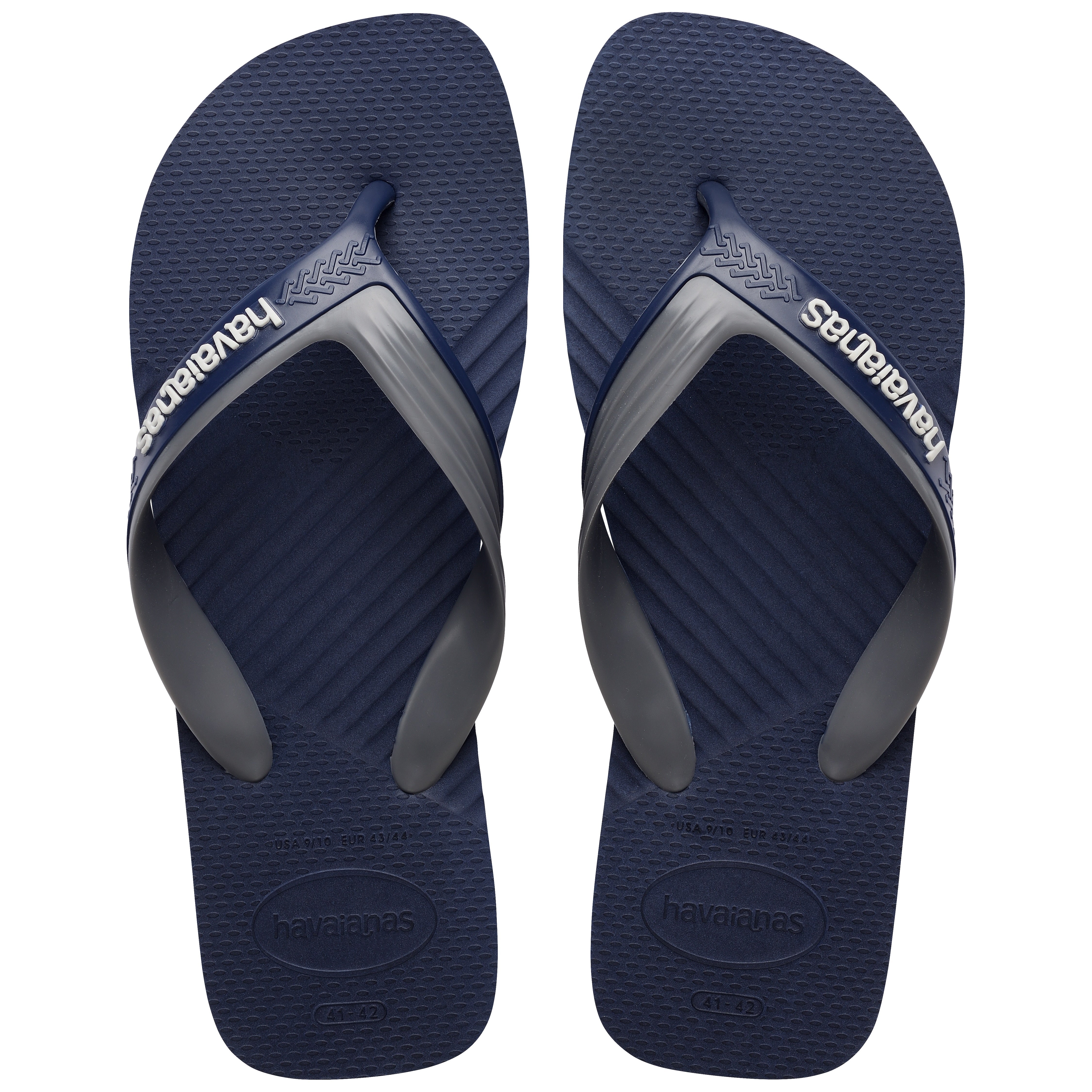 Pair of Havaianas navy blue flip flops with gray straps on a white background
