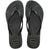 Pair of black glitter flip-flops with Havaianas logo on a white background
