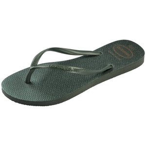 single, left side Havaianas green flip flop with a textured sole on a white background on a white background