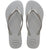 Pair of grey glitter flip flops with Havaianas logo on a white background