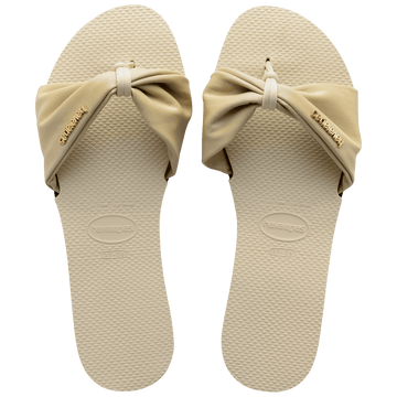 Women's cream sandal with bow detail, top view