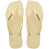 Pair of buttercream flip flops with a brand logo on a white background