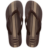 Pair of Havaianas flip flops with brown striped pattern on a white background