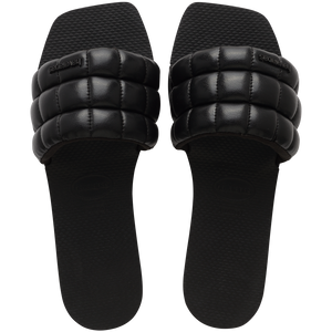 Women's black puffy slide top view