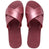 Pair of pink sandals with Havaianas branding on a white background