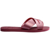 Single, right, side view pink sandal with Havaianas branding on a white background