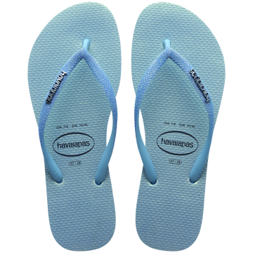 Women's iridescent blue flip flops with glitter straps top view